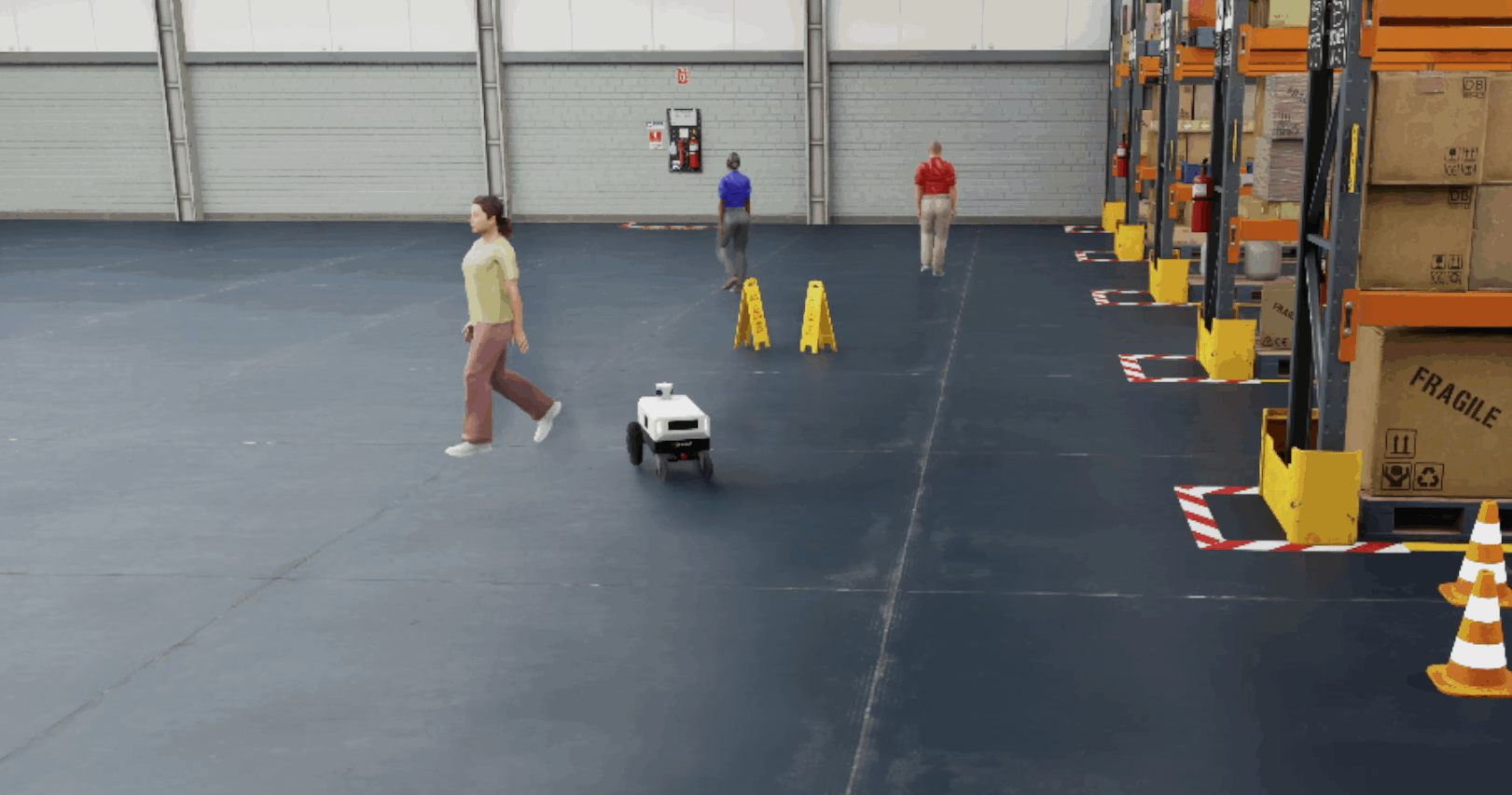 Humans walking around a warehouse environment.